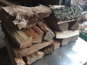 Split oak logs,